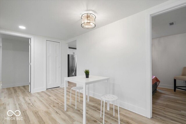 450 Historic Pleasant St, Noblesville, IN 46060 - dining area with light wood finished floors and baseboards