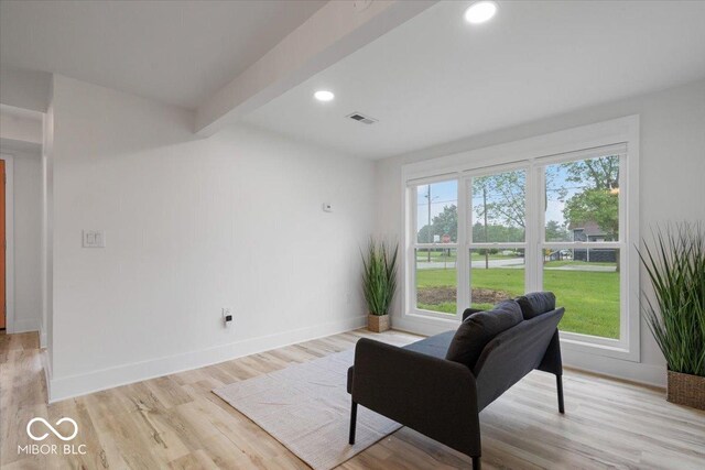 450 Historic Pleasant St, Noblesville, IN 46060 - living area featuring baseboards, light wood-style flooring, recessed lighting, and beam ceiling