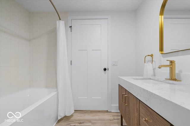 450 Historic Pleasant St, Noblesville, IN 46060 - full bathroom with vanity, shower / bath combination with curtain, and wood finished floors