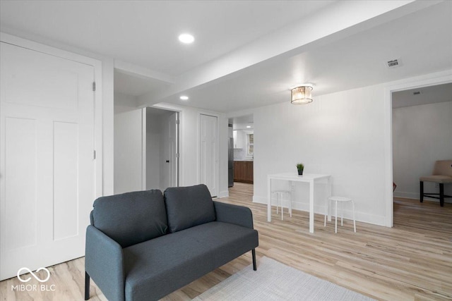 450 Historic Pleasant St, Noblesville, IN 46060 - sitting room featuring light wood-style flooring, baseboards, and recessed lighting