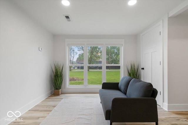 450 Historic Pleasant St, Noblesville, IN 46060 - living area with baseboards, light wood finished floors, and recessed lighting