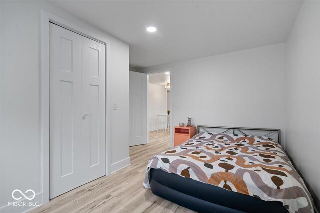 450 Historic Pleasant St, Noblesville, IN 46060 - bedroom with light wood finished floors, recessed lighting, and baseboards