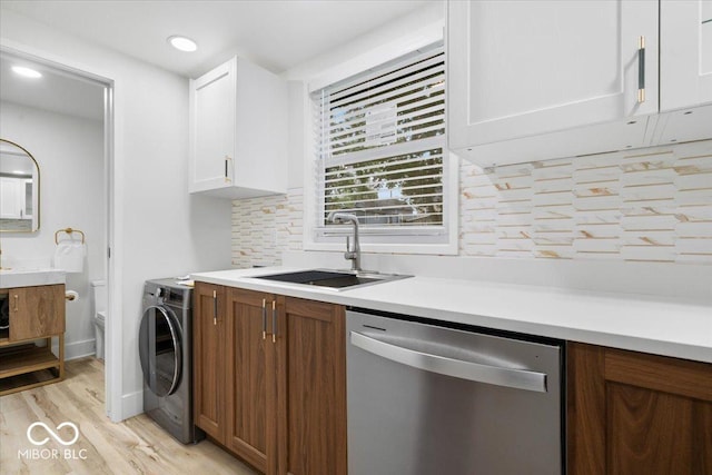 450 Historic Pleasant St, Noblesville, IN 46060 - kitchen featuring dishwasher, a sink, washer / dryer, backsplash, and recessed lighting