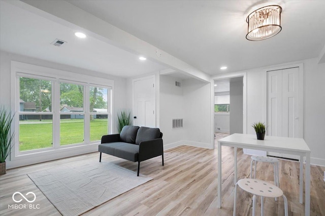 450 Historic Pleasant St, Noblesville, IN 46060 - living area featuring light wood-style flooring, baseboards, recessed lighting, and a chandelier