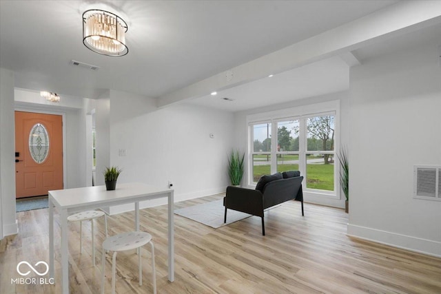 450 Historic Pleasant St, Noblesville, IN 46060 - entrance foyer featuring baseboards, a chandelier, light wood-style floors, and recessed lighting