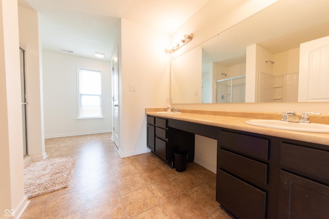 4712 Clairmont Dr, Columbus, IN 47203 - full bathroom featuring double vanity, a shower with shower door, and baseboards