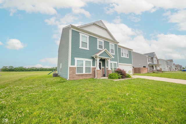 4712 Clairmont Dr, Columbus, IN 47203 - view of front of home with concrete driveway, brick siding, central AC, a front lawn, and an attached garage