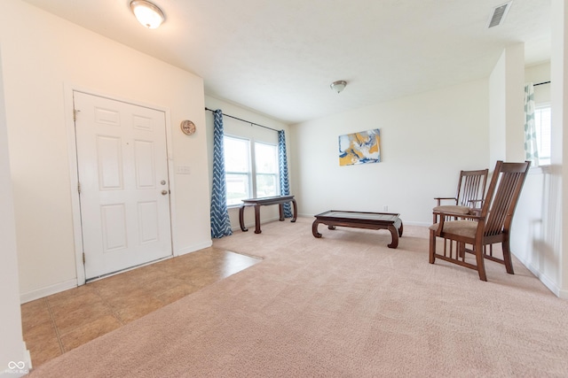 4712 Clairmont Dr, Columbus, IN 47203 - entryway featuring baseboards and carpet floors