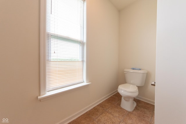 4712 Clairmont Dr, Columbus, IN 47203 - bathroom with toilet, baseboards, and tile patterned flooring