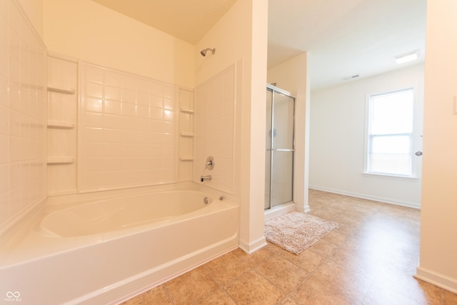 4712 Clairmont Dr, Columbus, IN 47203 - full bathroom featuring a shower, a bath, and baseboards