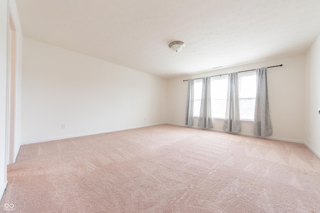 4712 Clairmont Dr, Columbus, IN 47203 - empty room featuring light colored carpet and baseboards
