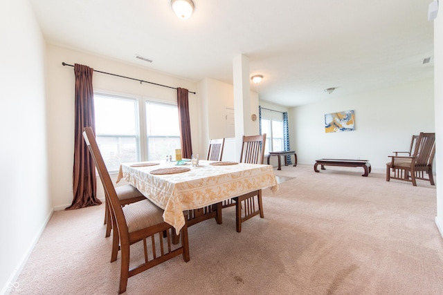 4712 Clairmont Dr, Columbus, IN 47203 - dining space with light colored carpet and baseboards