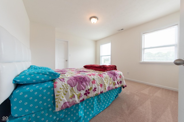 4712 Clairmont Dr, Columbus, IN 47203 - carpeted bedroom featuring baseboards
