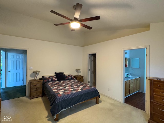 7970 Cobblesprings Dr, Avon, IN 46123 - carpeted bedroom featuring a sink, lofted ceiling, connected bathroom, baseboards, and ceiling fan