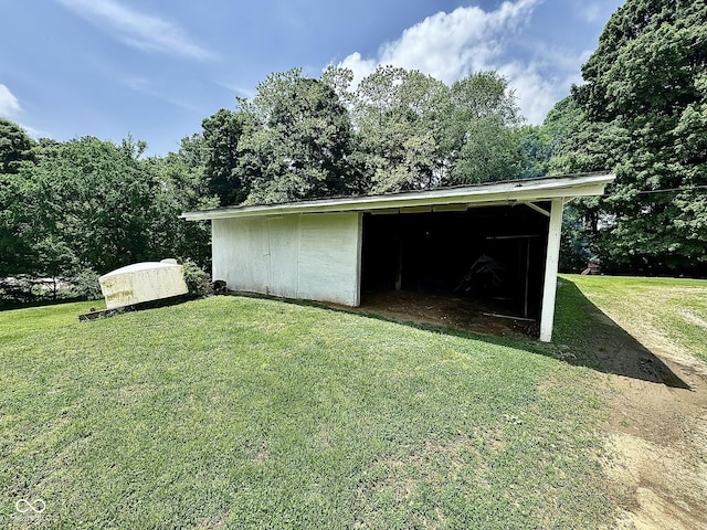 200 S Madison St, Bowling Green, IN 47833 - view of pole building featuring a lawn