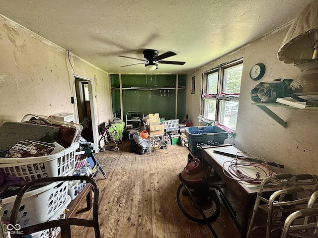 200 S Madison St, Bowling Green, IN 47833 - bedroom with a textured ceiling, hardwood / wood-style floors, a ceiling fan, and a textured wall