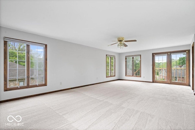 659 Carson Ct, Carmel, IN 46033 - carpeted spare room with plenty of natural light and baseboards
