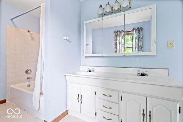 659 Carson Ct, Carmel, IN 46033 - full bath with double vanity, shower / tub combo with curtain, baseboards, and tile patterned floors
