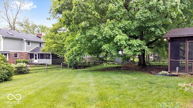 659 Carson Ct, Carmel, IN 46033 - view of yard with a sunroom
