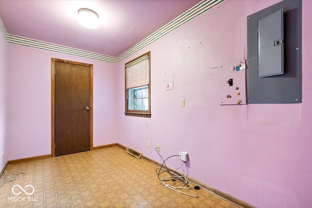 659 Carson Ct, Carmel, IN 46033 - empty room with electric panel, light floors, crown molding, and baseboards