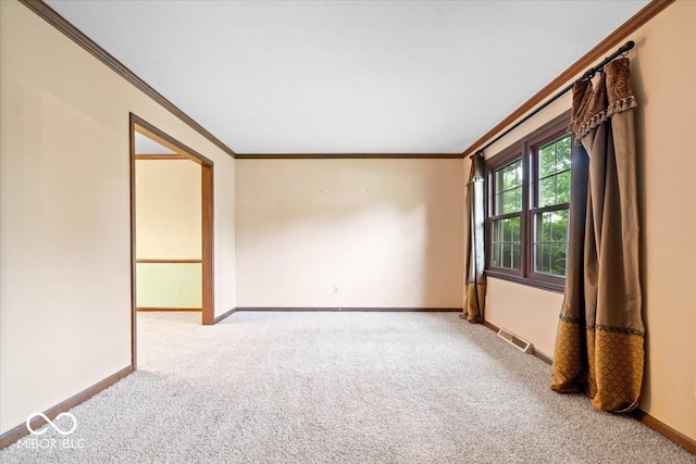 659 Carson Ct, Carmel, IN 46033 - carpeted empty room featuring crown molding and baseboards