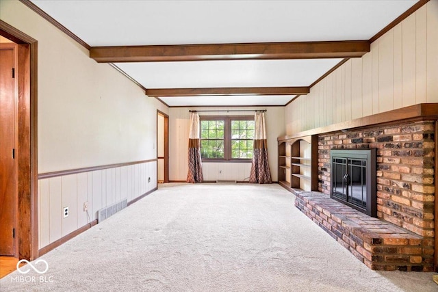 659 Carson Ct, Carmel, IN 46033 - unfurnished living room featuring beam ceiling, a fireplace, carpet flooring, built in features, and ornamental molding