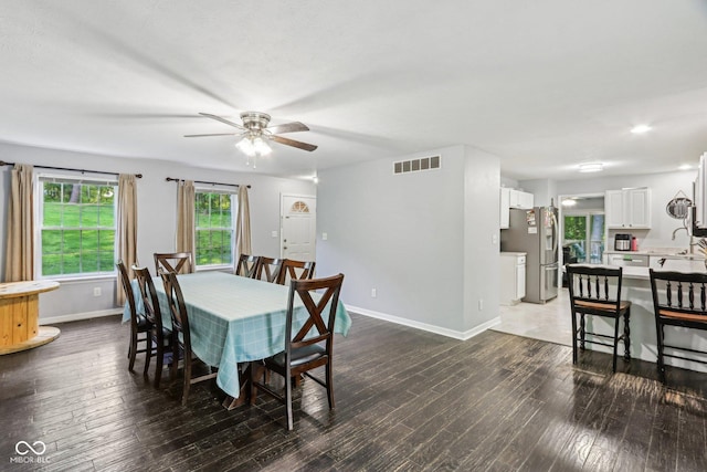 6804 Erika Ln, Nashville, IN 47448 - dining space with a ceiling fan, baseboards, and dark wood-style flooring