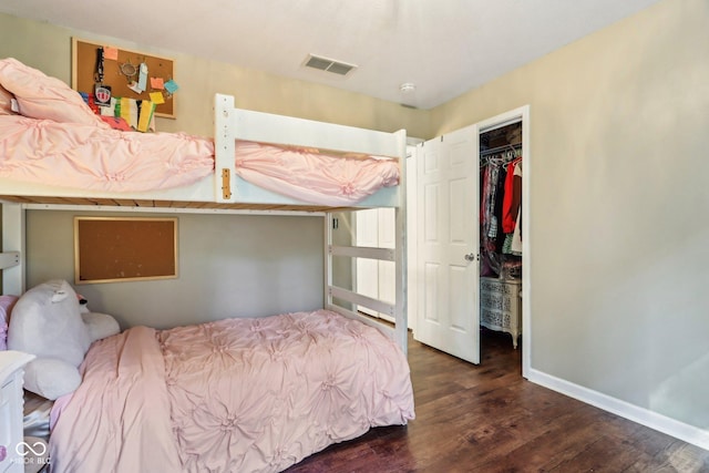 6804 Erika Ln, Nashville, IN 47448 - bedroom with wood finished floors, a closet, and baseboards