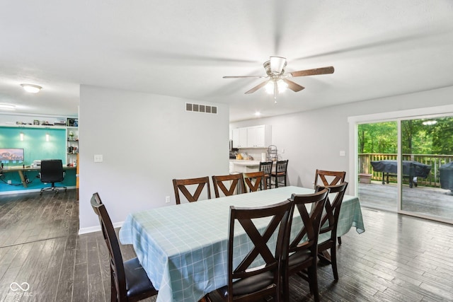 6804 Erika Ln, Nashville, IN 47448 - dining area featuring a desk, ceiling fan, and wood finished floors