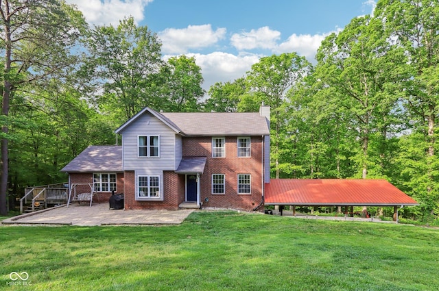 6804 Erika Ln, Nashville, IN 47448 - view of front of house with a chimney, brick siding, a front lawn, and a patio