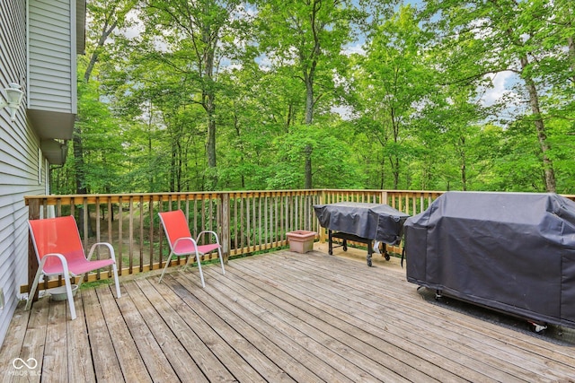 6804 Erika Ln, Nashville, IN 47448 - wooden terrace featuring a grill and view of scattered trees