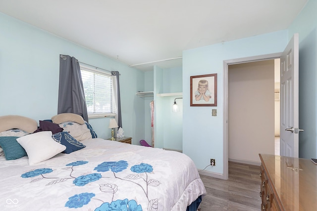 4967 Diana Dr, Indianapolis, IN 46203 - bedroom with wood finished floors and baseboards