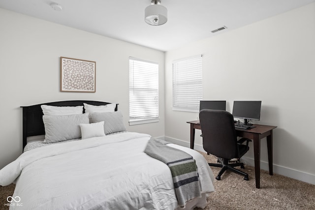 609 E 39th St, Indianapolis, IN 46205 - bedroom featuring baseboards and carpet floors