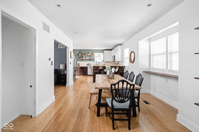 609 E 39th St, Indianapolis, IN 46205 - dining space featuring light wood finished floors