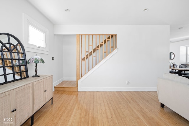 609 E 39th St, Indianapolis, IN 46205 - foyer entrance with stairs, light wood-style flooring, and plenty of natural light