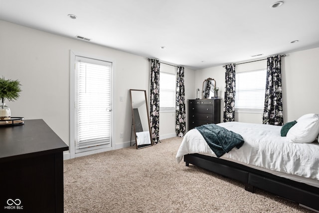 609 E 39th St, Indianapolis, IN 46205 - bedroom with carpet, multiple windows, and recessed lighting
