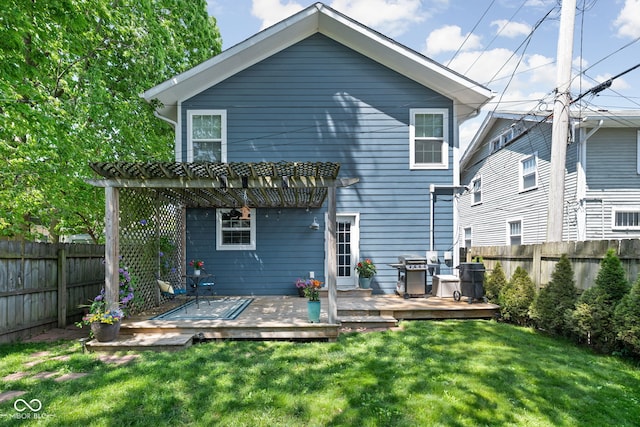 609 E 39th St, Indianapolis, IN 46205 - back of house featuring a pergola, a fenced backyard, and a deck