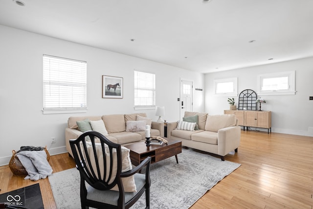 609 E 39th St, Indianapolis, IN 46205 - living room featuring healthy amount of natural light and light wood-style floors