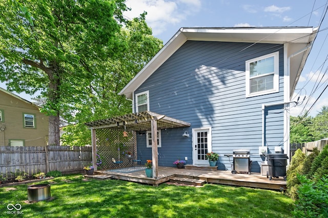 609 E 39th St, Indianapolis, IN 46205 - back of house with a pergola, a fenced backyard, and a wooden deck