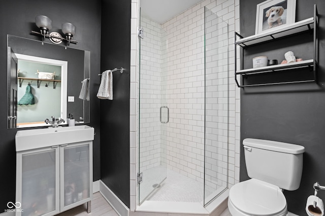 609 E 39th St, Indianapolis, IN 46205 - bathroom featuring a shower stall and vanity