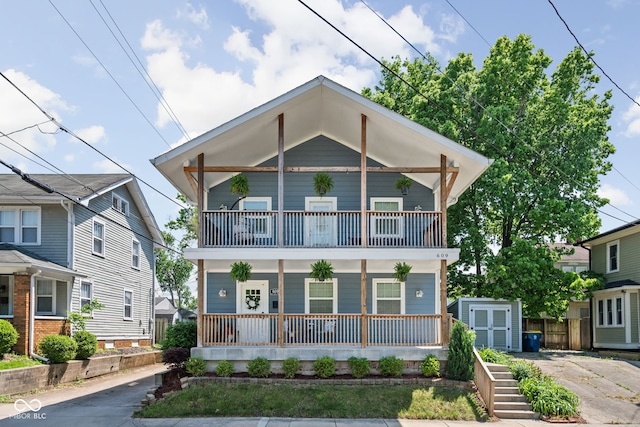 609 E 39th St, Indianapolis, IN 46205 - view of front of home featuring a balcony and covered porch