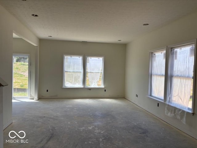 3897 Berkdale Ct, Columbus, IN 47203 - spare room with a textured ceiling