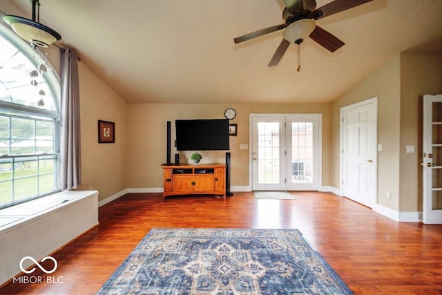 17310 N Willman Rd, Eaton, IN 47338 - living room with lofted ceiling, wood finished floors, a ceiling fan, and baseboards