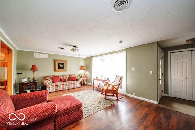17310 N Willman Rd, Eaton, IN 47338 - living room with a textured ceiling, wood finished floors, and baseboards