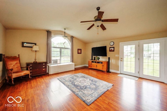 17310 N Willman Rd, Eaton, IN 47338 - living area with lofted ceiling, a ceiling fan, wood finished floors, and baseboards