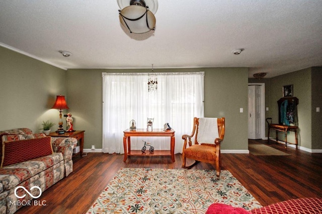 17310 N Willman Rd, Eaton, IN 47338 - living area with wood finished floors, baseboards, and a chandelier