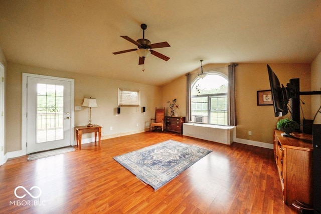 17310 N Willman Rd, Eaton, IN 47338 - living area with healthy amount of natural light, a ceiling fan, lofted ceiling, wood finished floors, and baseboards