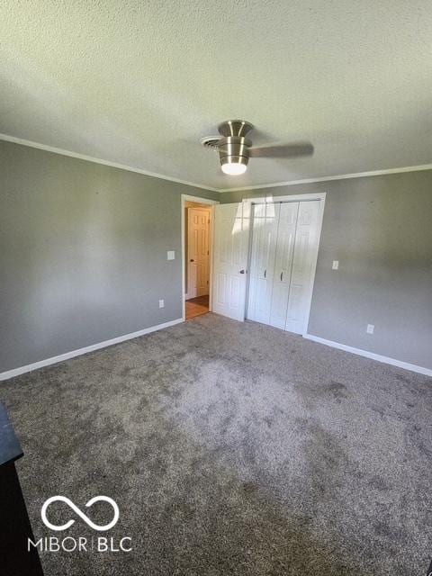 17310 N Willman Rd, Eaton, IN 47338 - unfurnished bedroom with crown molding, baseboards, carpet floors, a textured ceiling, and a ceiling fan