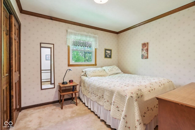 9240 E Woodview Dr, Bloomington, IN 47401 - bedroom with ornamental molding, light colored carpet, and a closet
