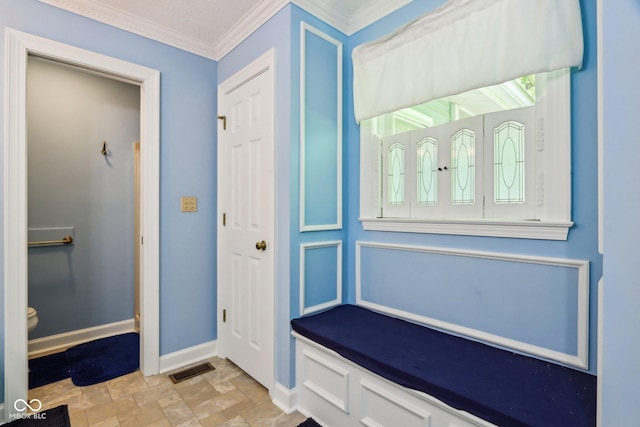 9240 E Woodview Dr, Bloomington, IN 47401 - mudroom featuring crown molding and stone finish floors